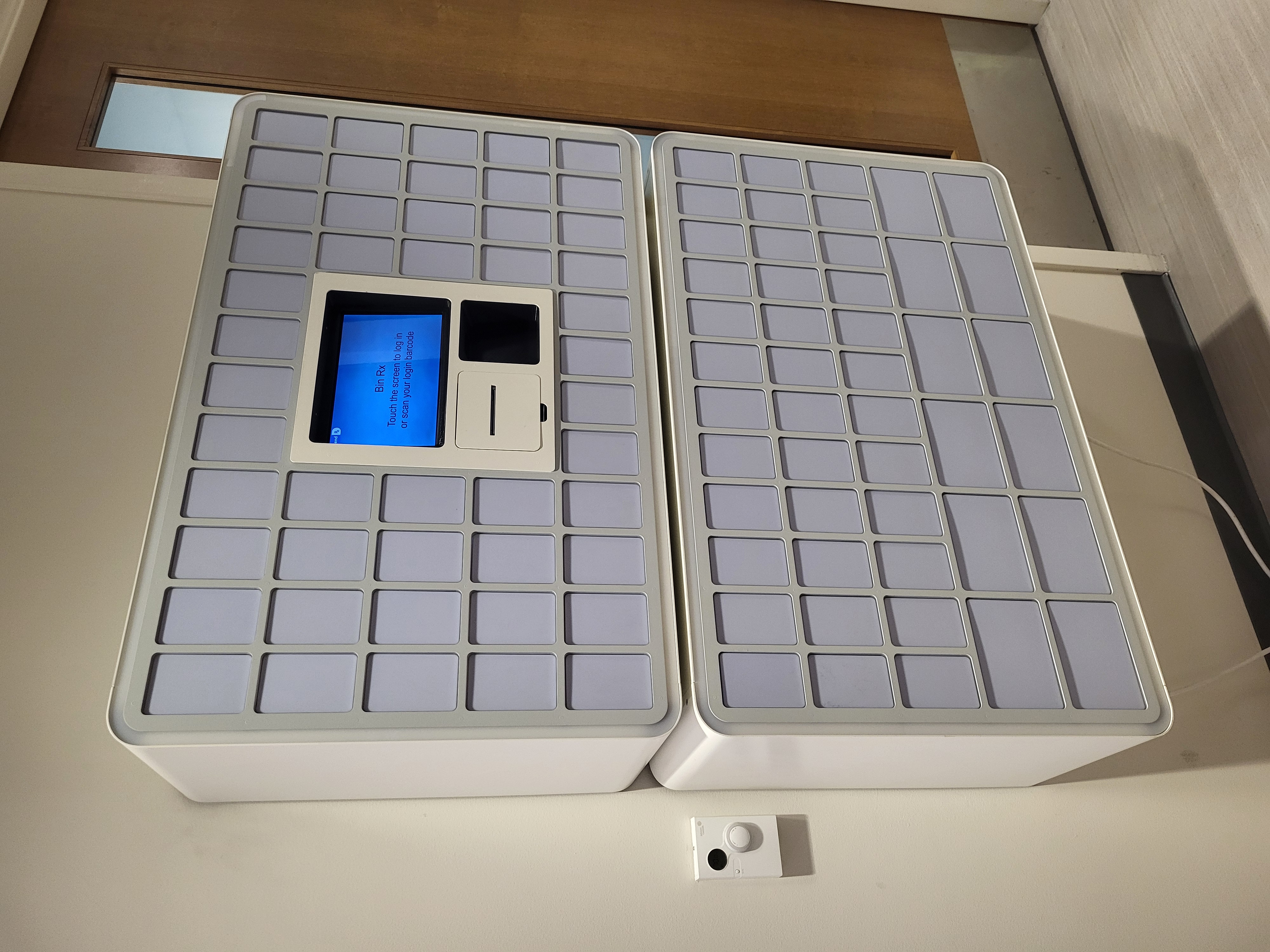 In-clinic dispensing unit installed on a clinic wall